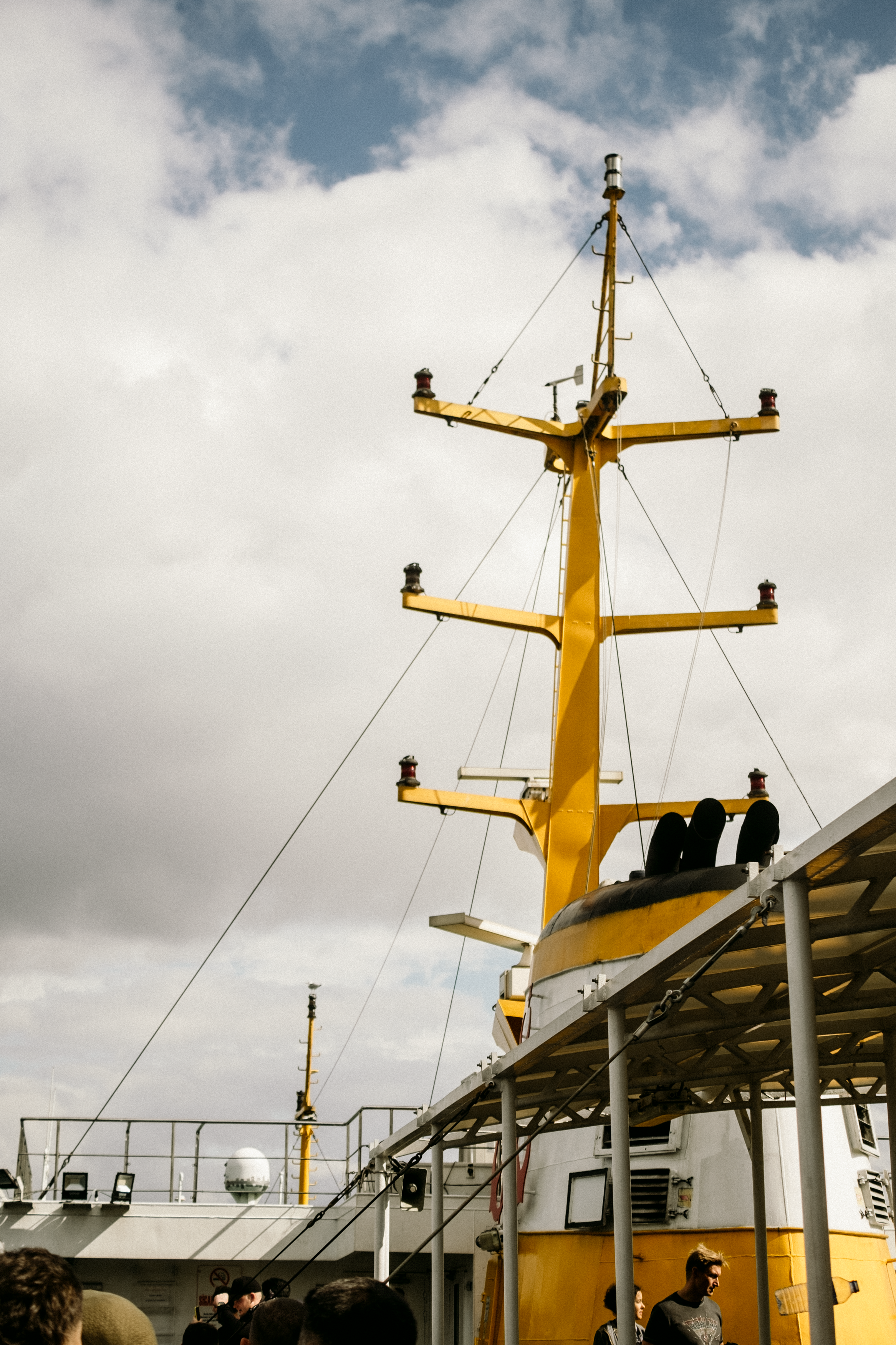 Yellow Mast of Ship against Cloudy Sky · Free Stock Photo