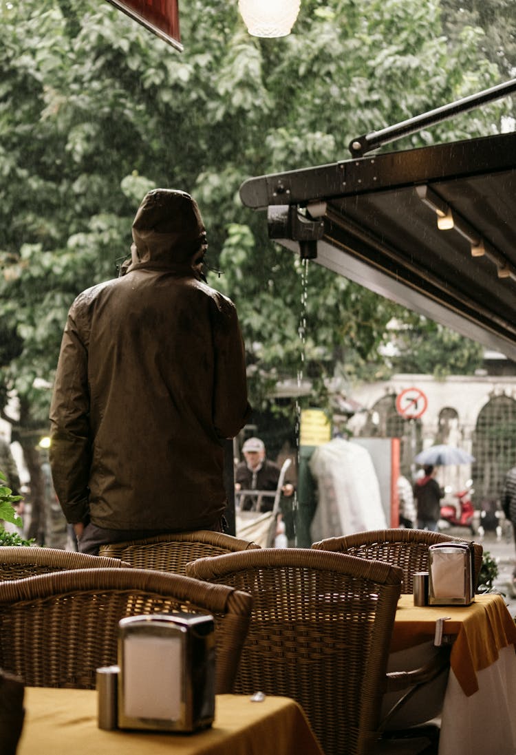 Tables On Cafe Outdoor Terrace In Rain