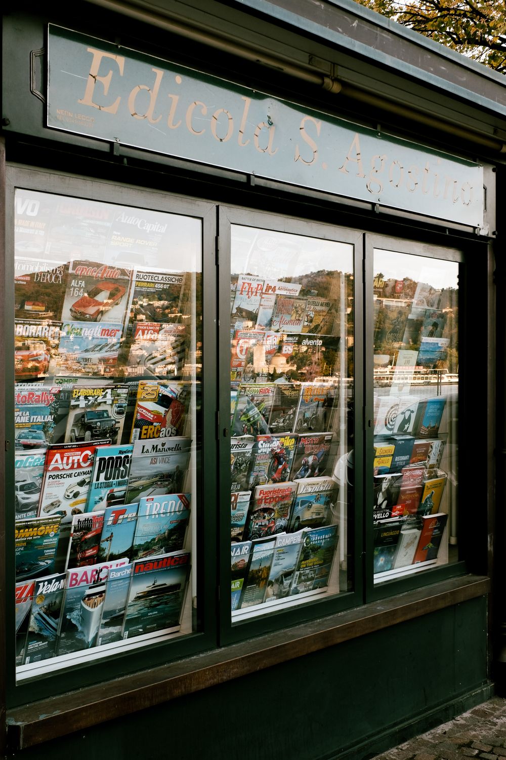 Magazines in Booth Windows · Free Stock Photo