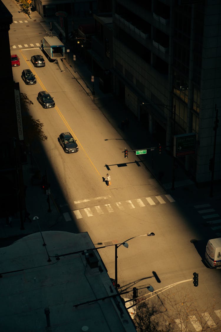 Man Standing In The Middle Of A Street