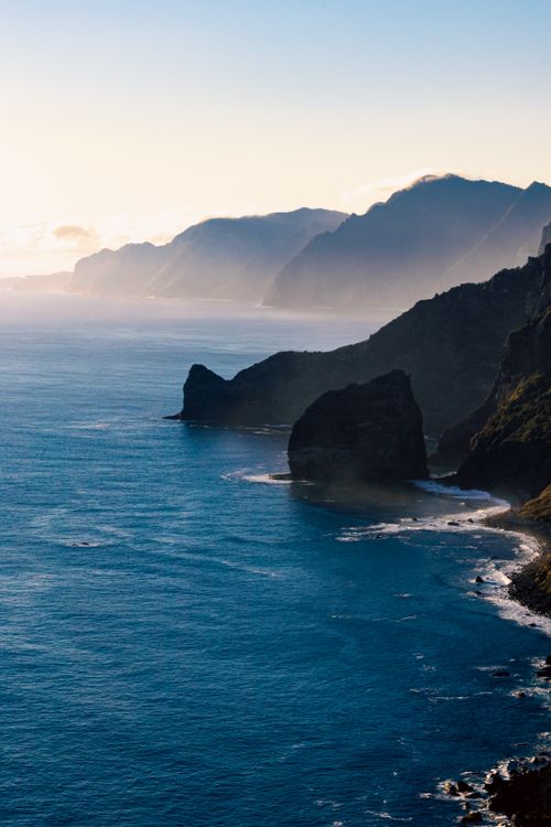Free Discover the rugged cliffs and serene ocean views at Madeira, Portugal's stunning coast. Stock Photo