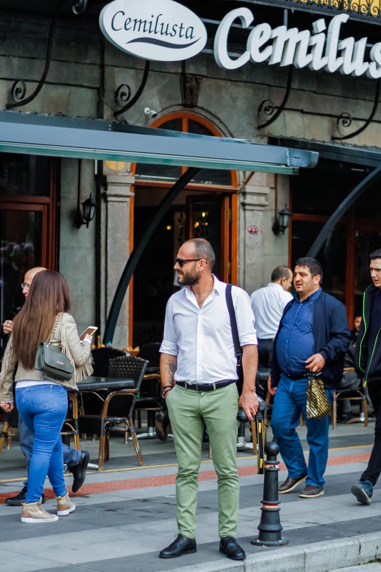 Bearded Man In Sunglasses On City Street