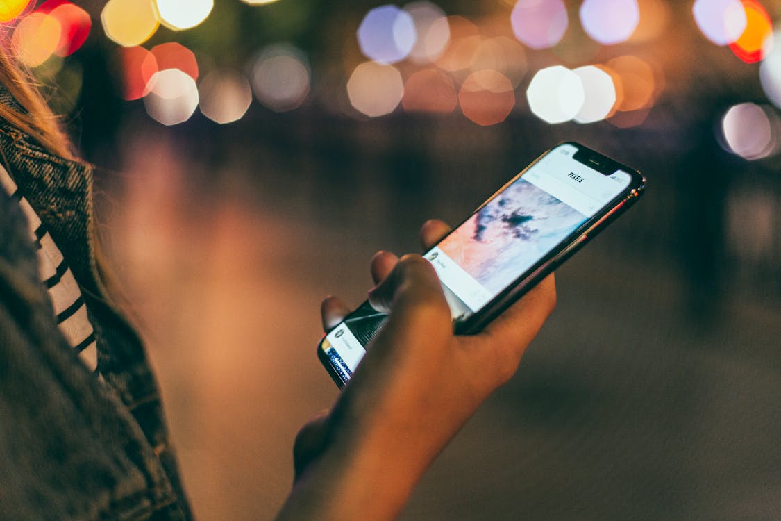 Person Holding Space Gray Iphone X