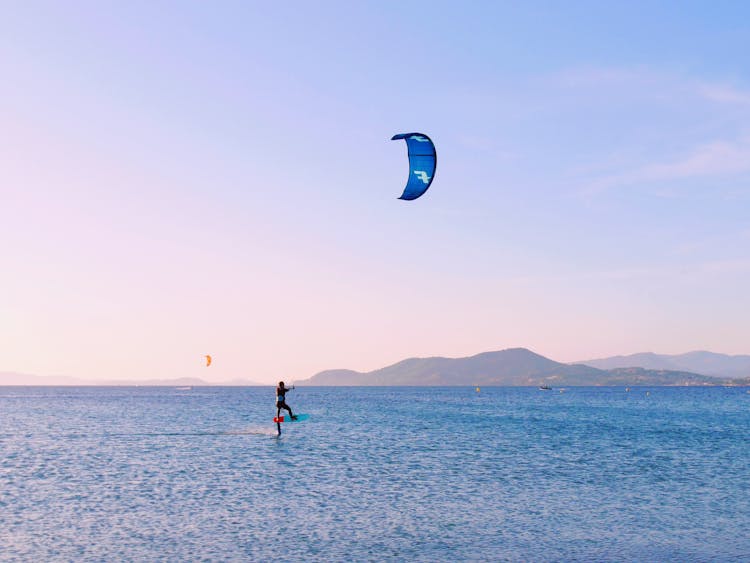 A Person Doing Kitesurfing 