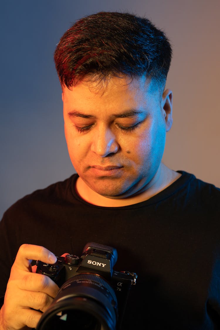 Close Up Photo Of A Man Looking At A Camera