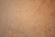 Brown Sand in Close-up Photography