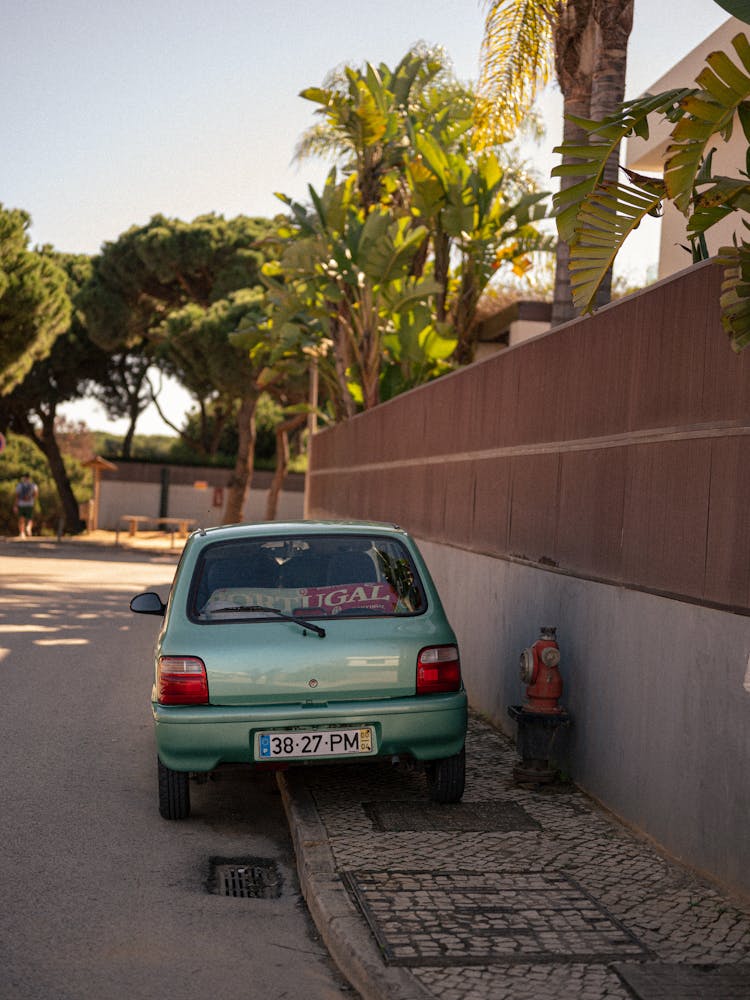 Suzuki Alto Parked On Street