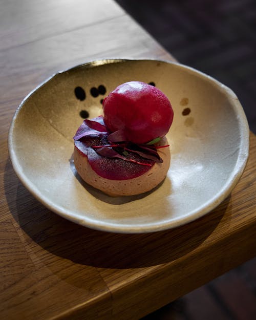 Pastry with Pink Toppings on Ceramic Plate