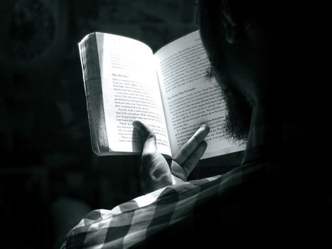Grayscale Photo of Woman Reading Book