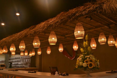 A Bar Counter with Hanging Lights