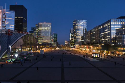 People Walking on Street during Night Time
