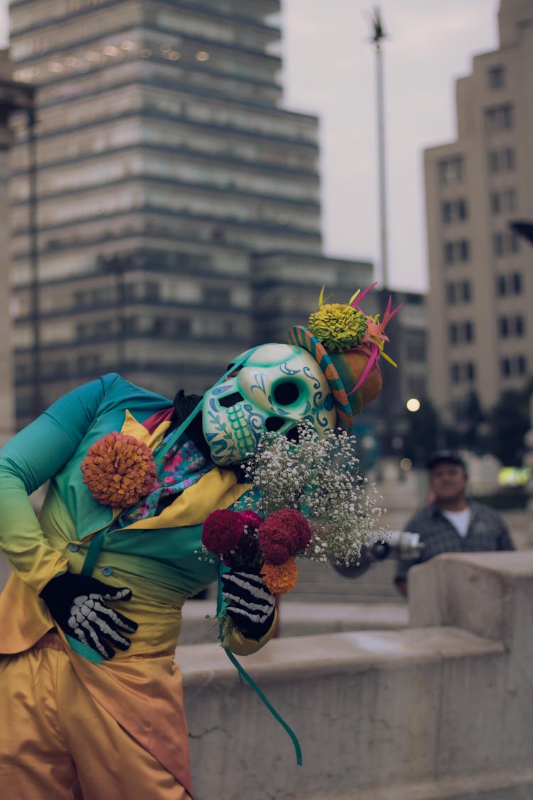 Person In Costume With Flowers