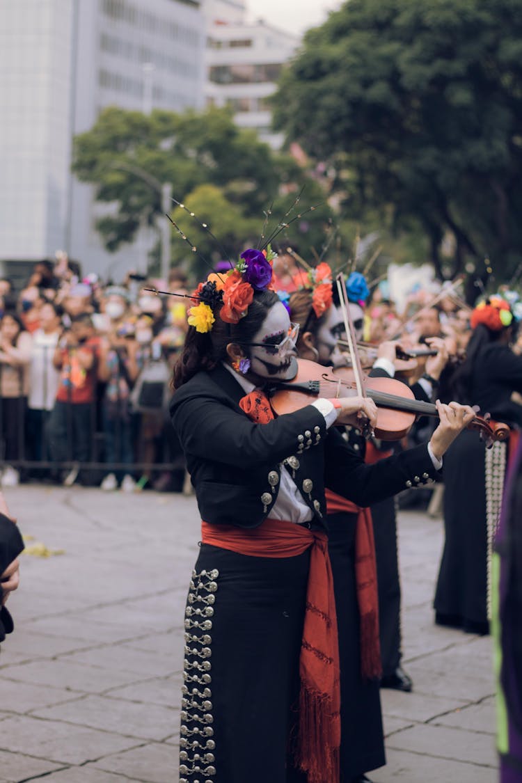 Women Playing Instruments During A Traditional Mexican Festival 