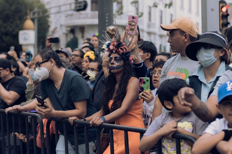diverse crowd watching parade