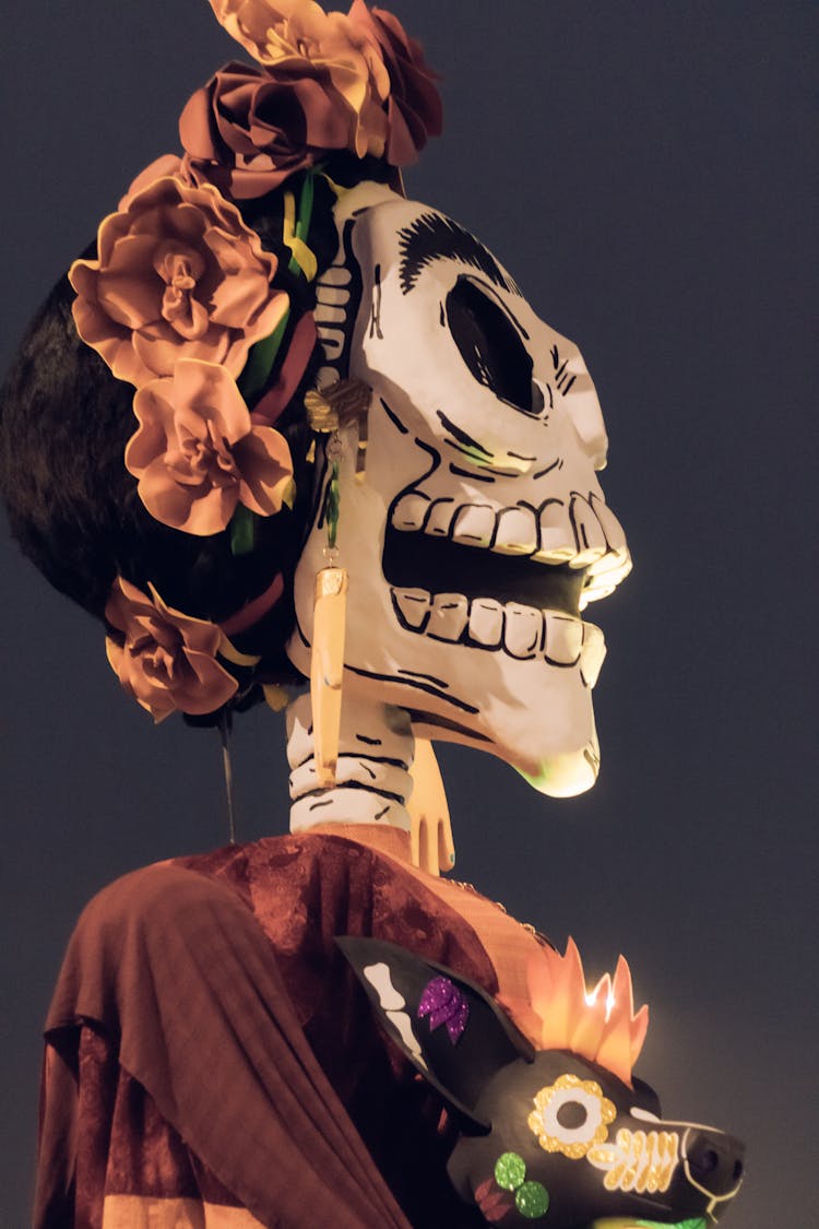 Close-up Of Scary Statue In Costume At Night Festival