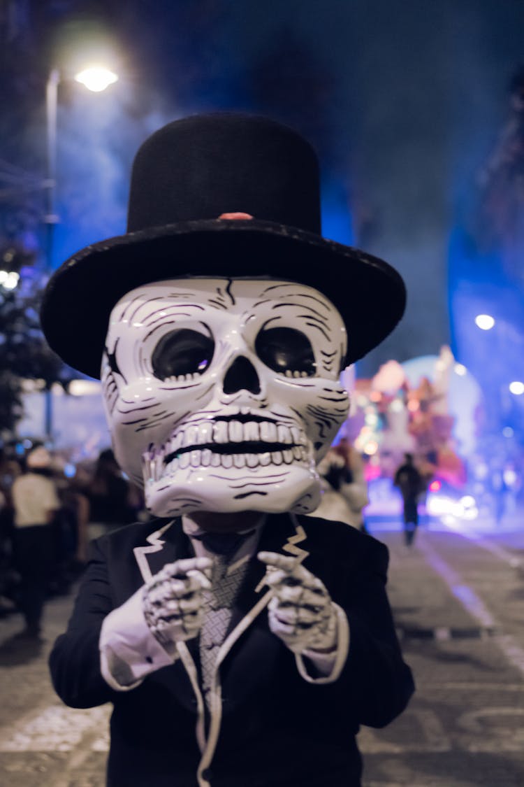 Man In Scary Costume At Street Festival At Night