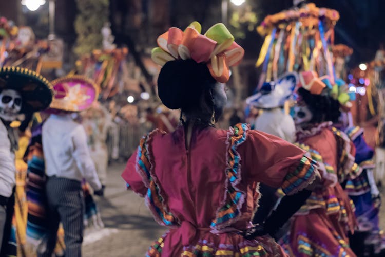 People Wearing Traditional Clothes In Parade