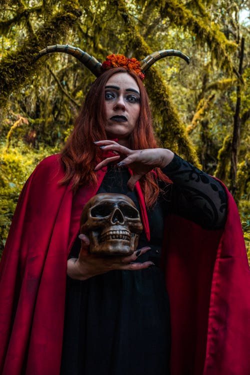 A Witch Holding a Skull