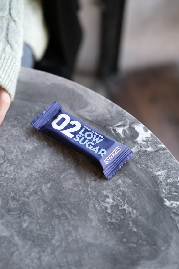 Individual Low Sugar Packet On Stone Table