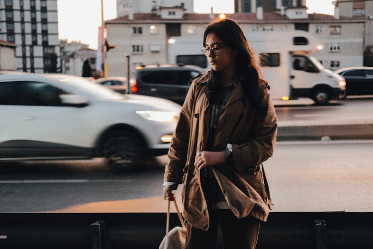 Woman Posing By Busy Highway