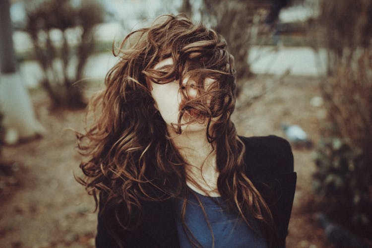 Portrait Of Woman With Hair Covering Face