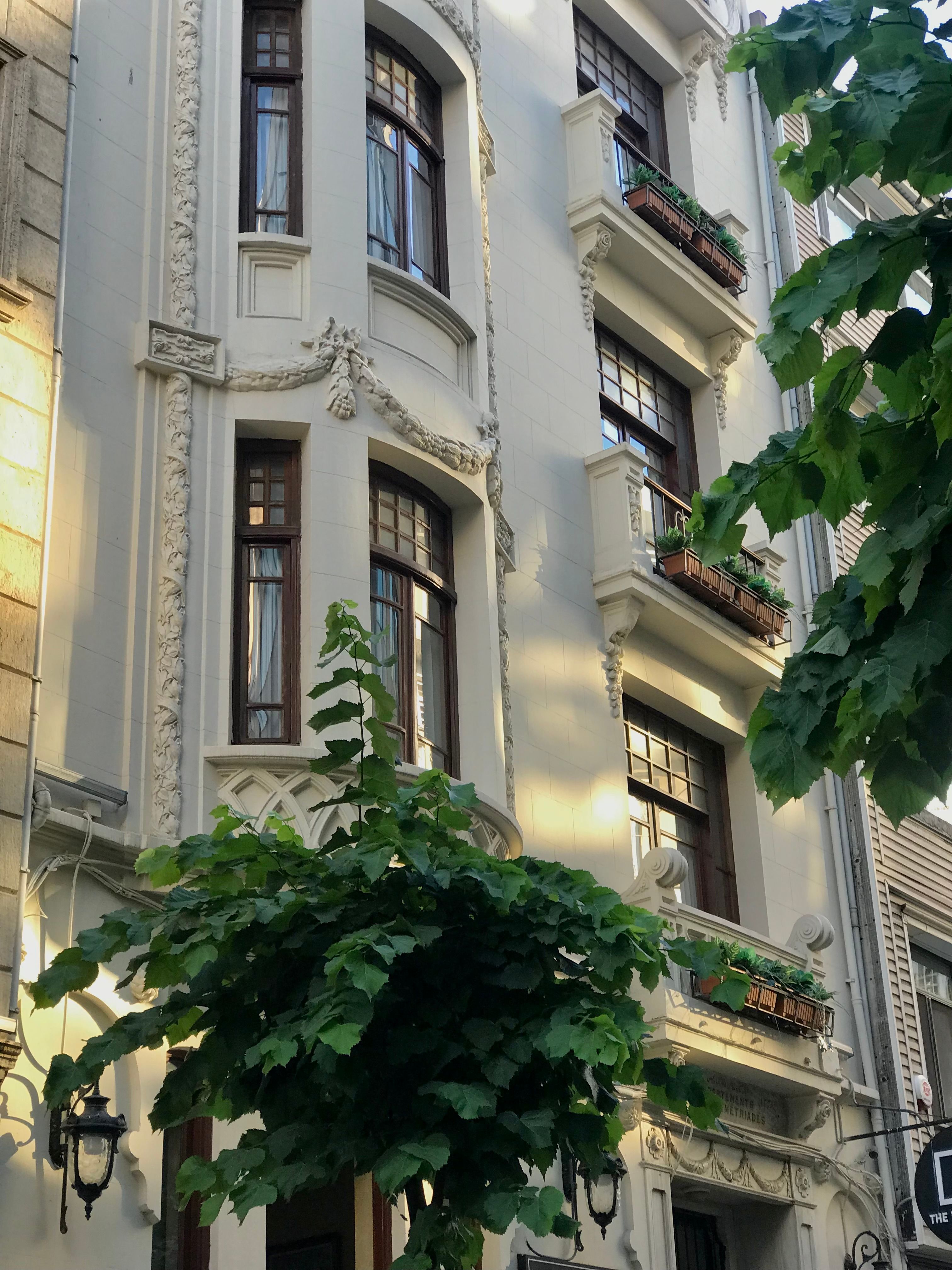 Elegant Art Nouveau architecture in Istanbul with ornate facade and balconies.