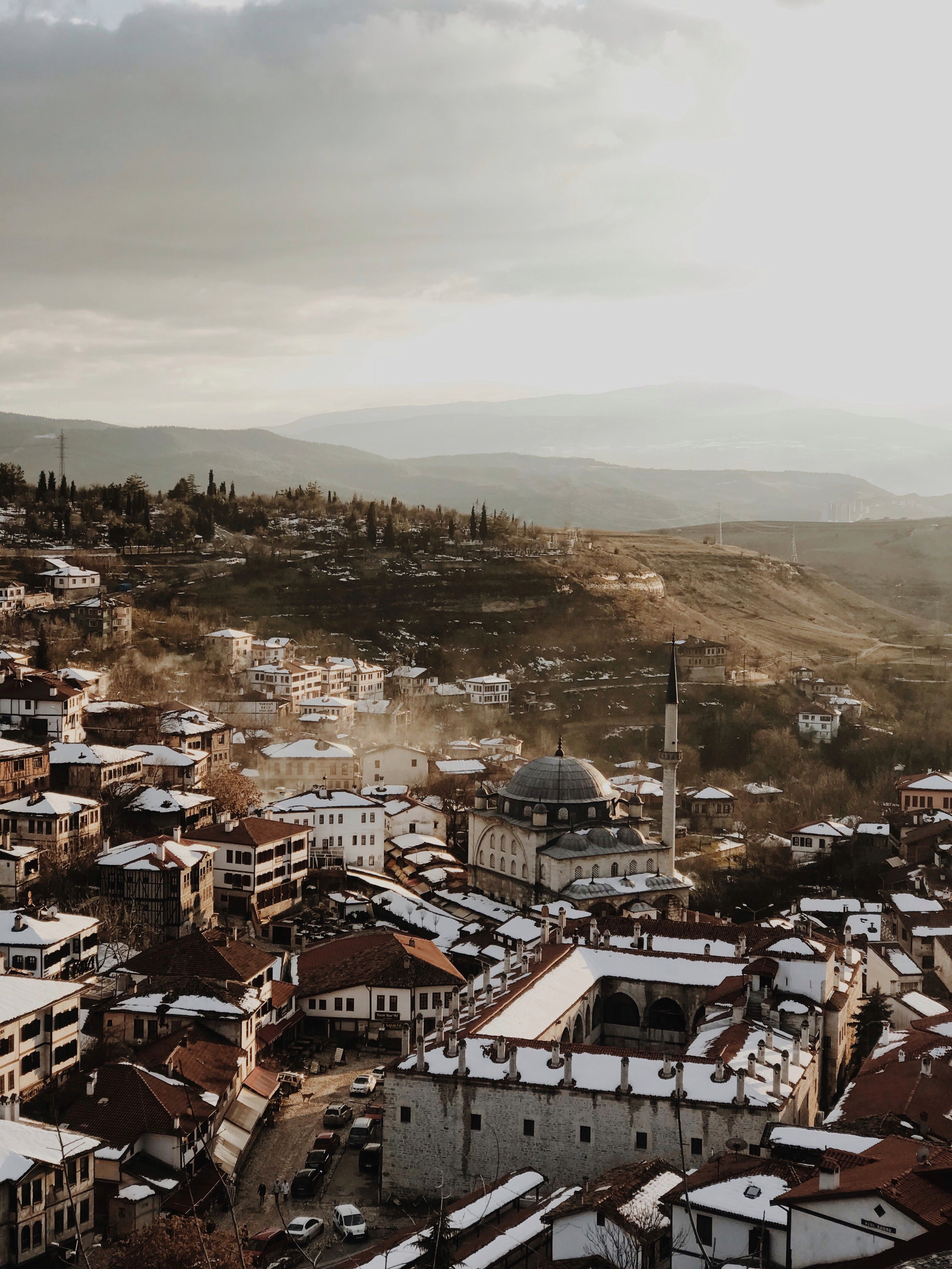 Experience the scenic beauty of Safranbolu, Turkey, with its historic architecture under a winter sunset.