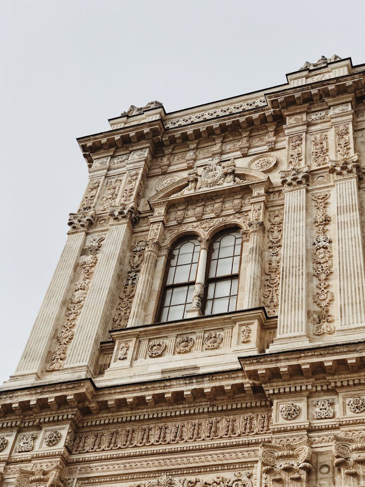 Historic Ornate Building On Sky Background