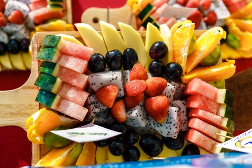 Free Colorful fruit platter featuring watermelon, strawberries, oranges, and more. Perfect for healthy eating. Stock Photo
