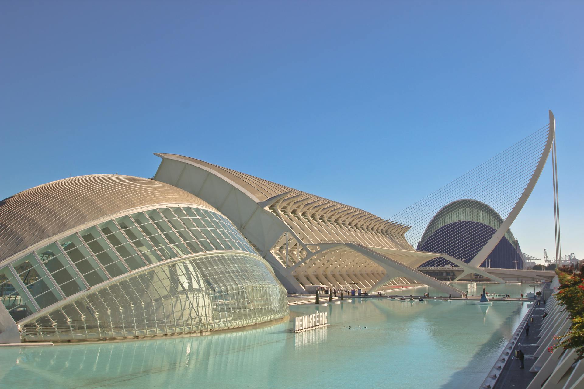 Futuristic architecture of the City of Arts and Sciences in Valencia captured in daylight.