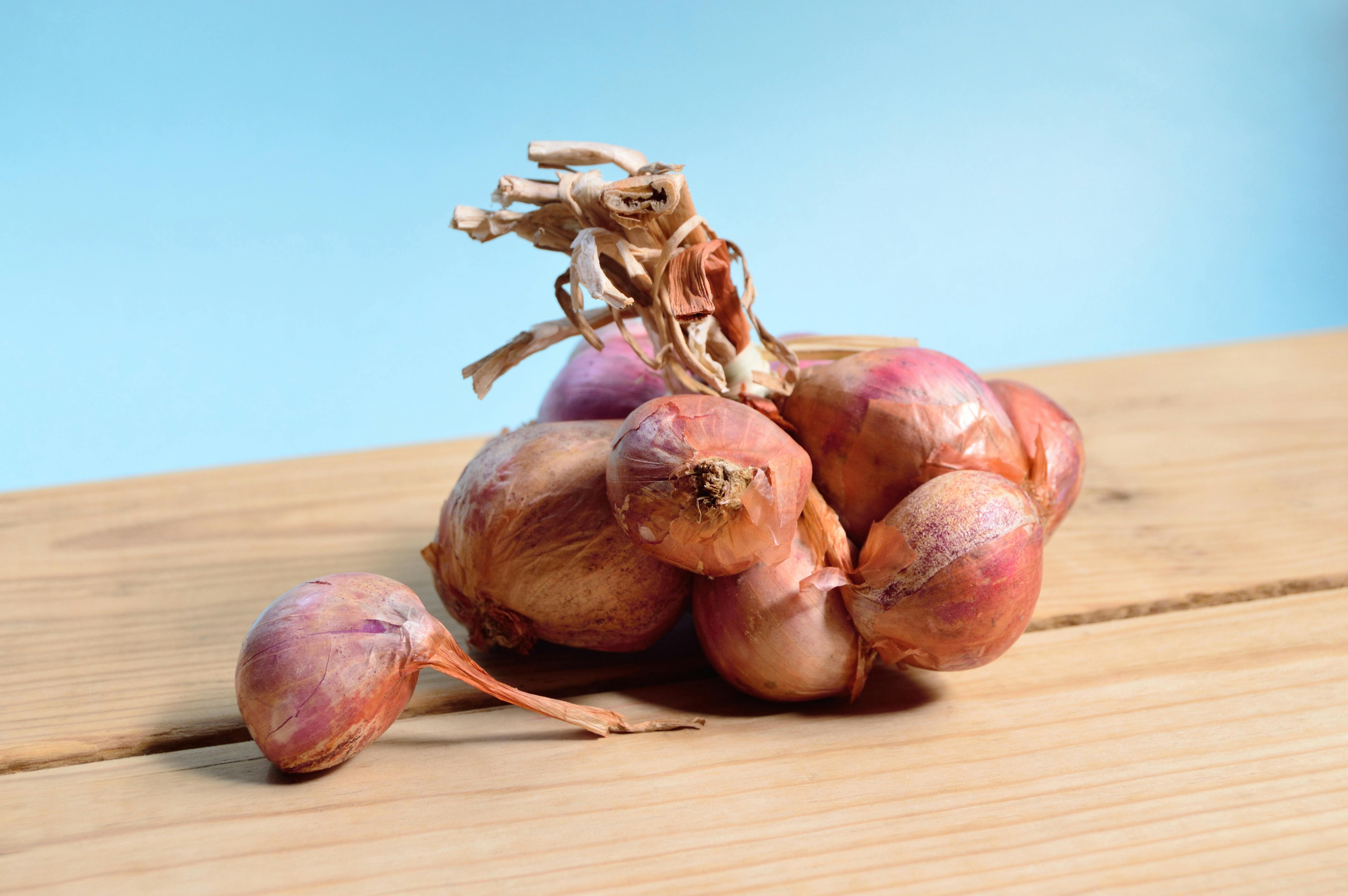 Table with onions. | Photo: Pexels
