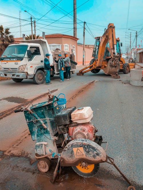 Photo of a Machinery in an Asphalt Road