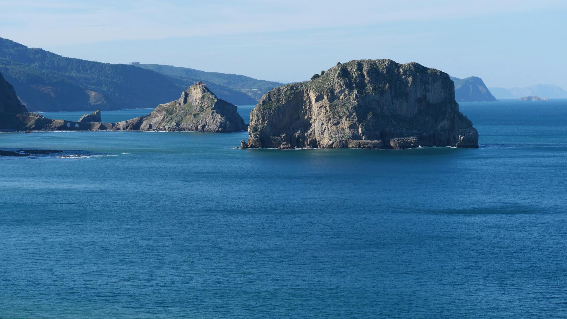 Sapphire Blue Sea and Gray Rocks