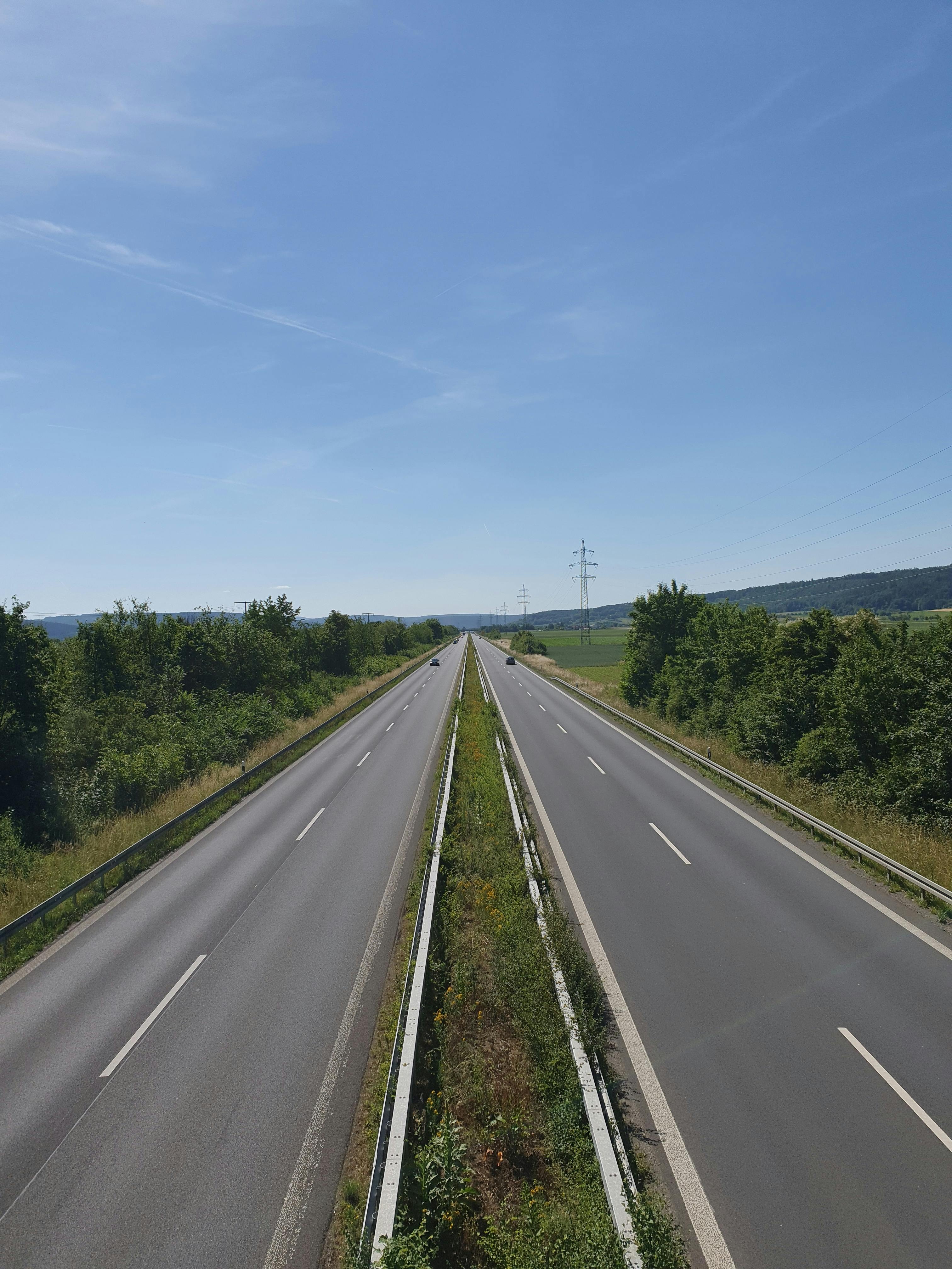 Yellow Painted Gray Road · Free Stock Photo