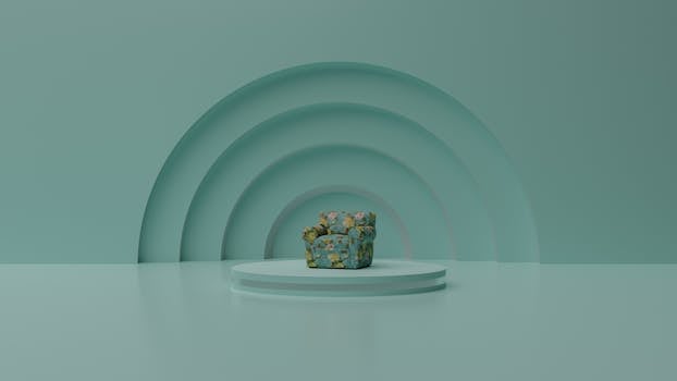 Floral chair on a platform in a minimalist turquoise space.