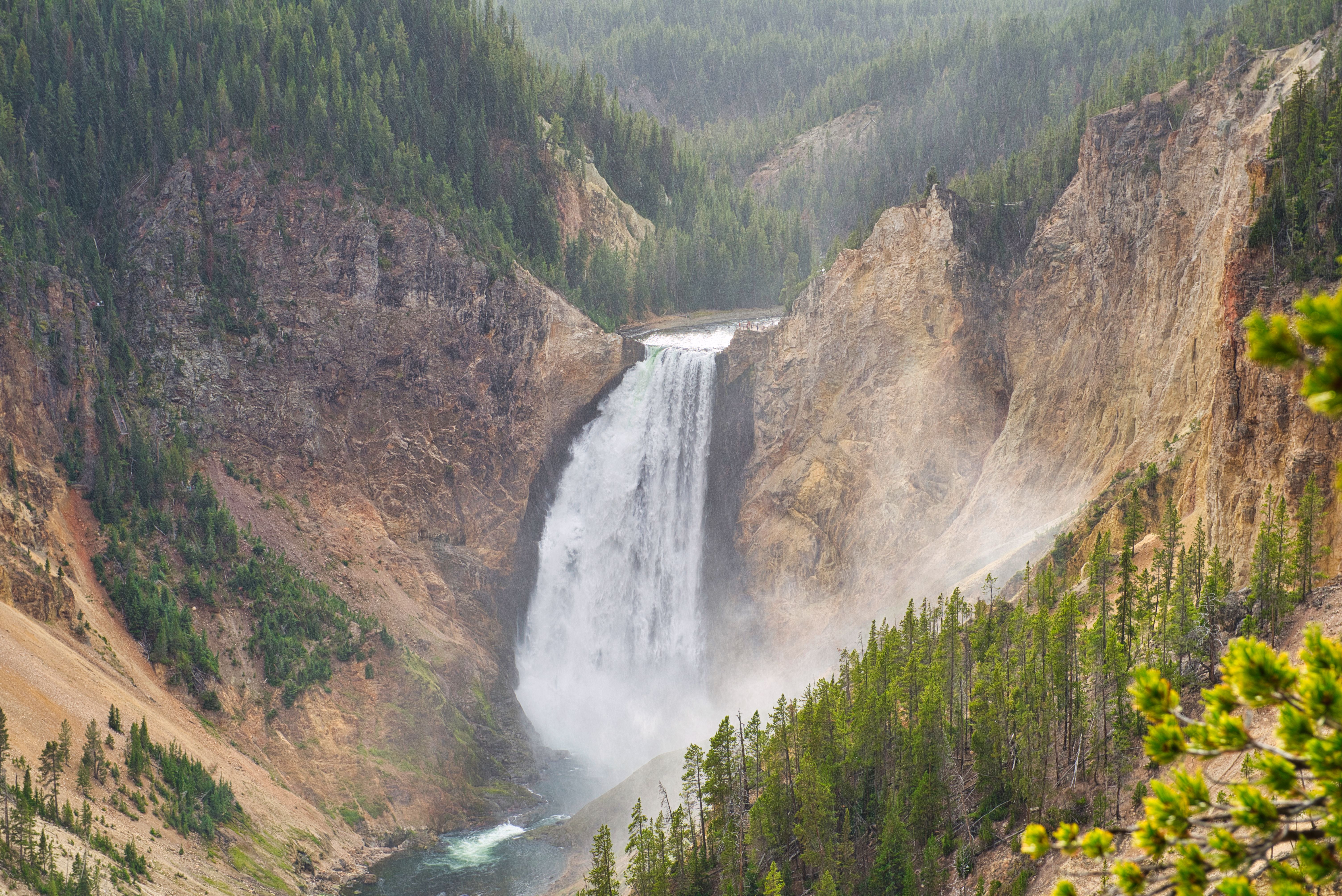 Tower Fall waterfall with rainbow Yellowstone