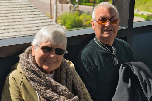 Elderly Couple Wearing Sunglasses