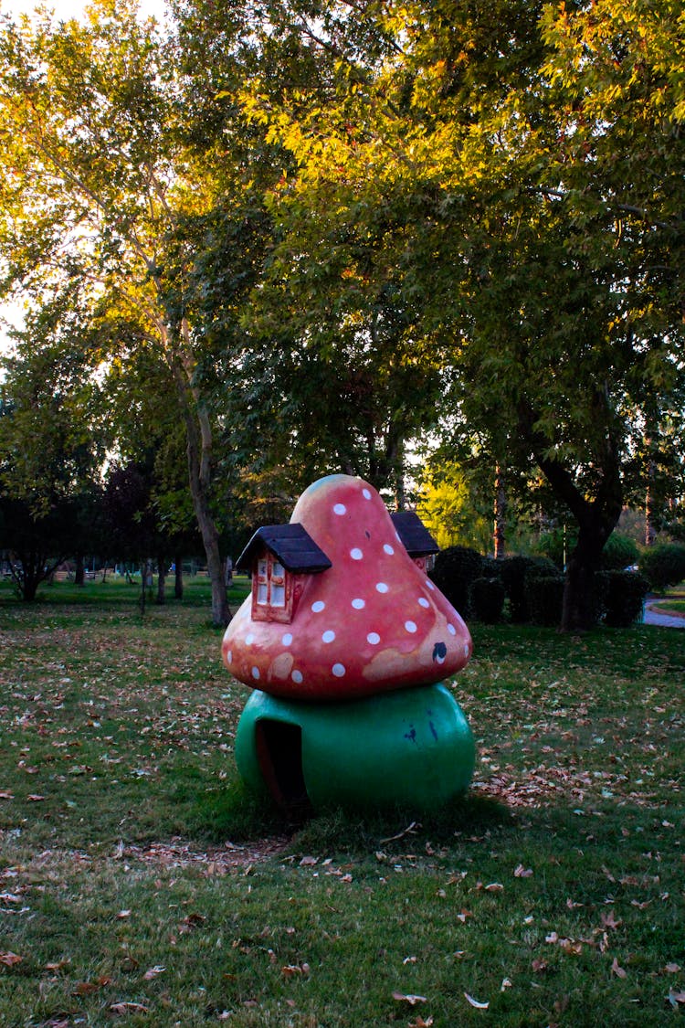 Mushroom House Decoration Standing Outdoors In Autumn