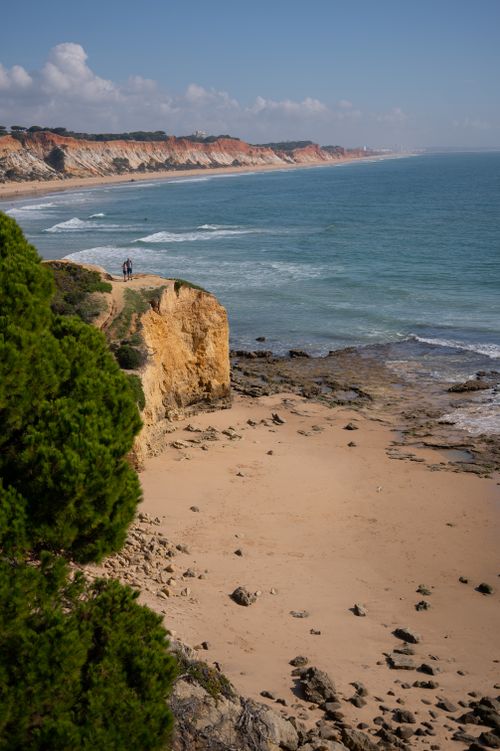 Free Discover the breathtaking cliffs and serene beach views in Albufeira, Portugal. Stock Photo