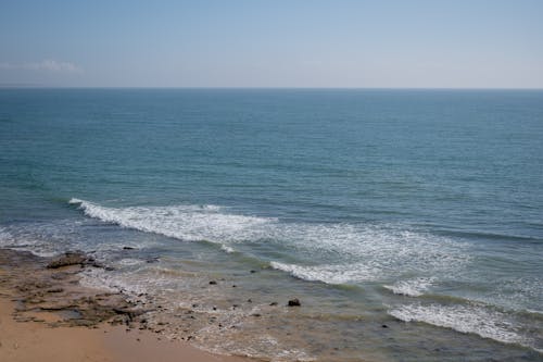 Бесплатное стоковое фото с водная поверхность, волны, голубое небо