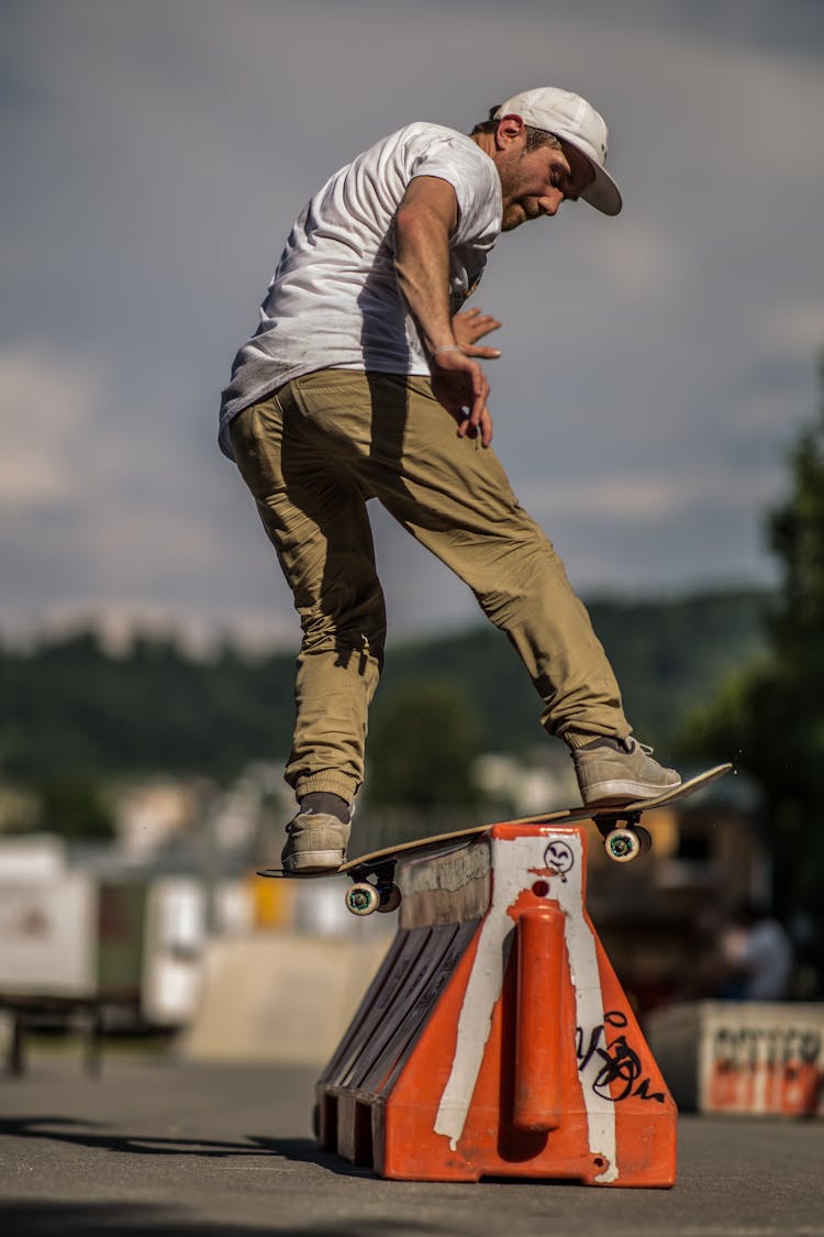 Person Doing Trick On Skateboard