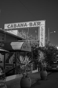 Black and white photo of Cabana Bar in Albufeira, Portugal with vintage aesthetic.