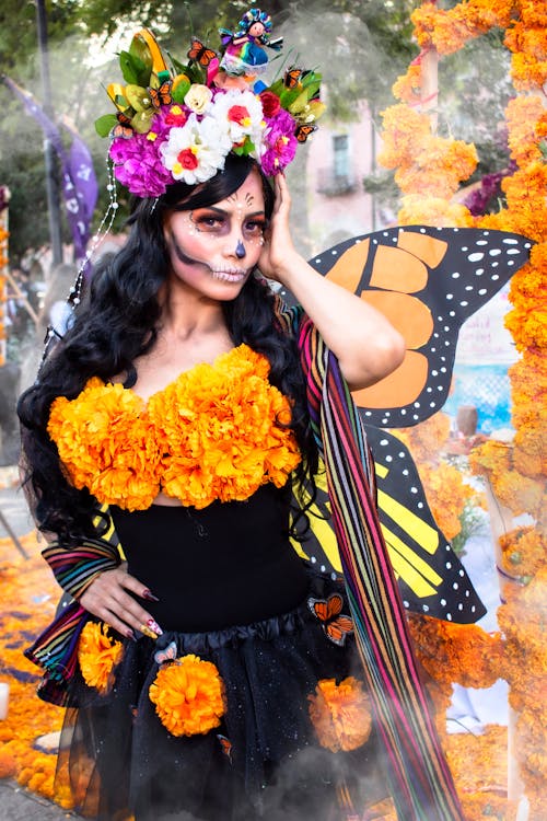 Portrait of Woman Wearing Traditional Mexican Costume in Front of Graffiti