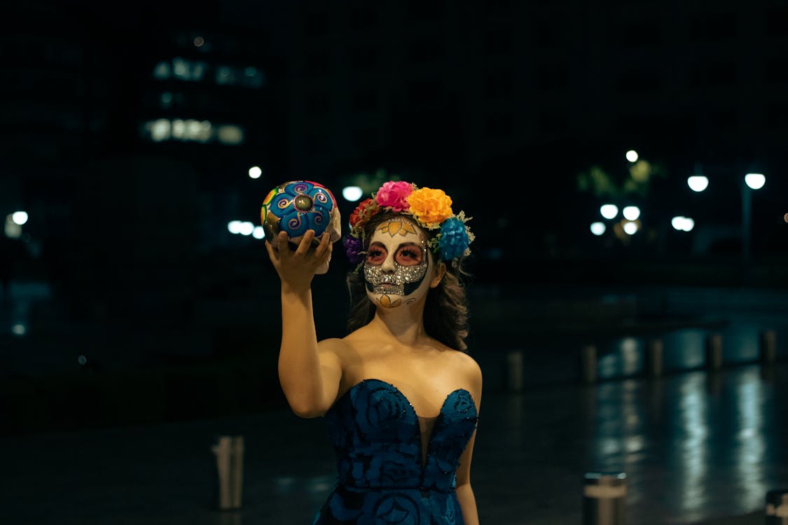 Woman Wearing Dia De Los Muertos Costume