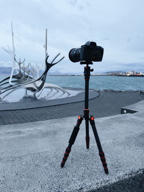Free Camera setup facing the iconic Sun Voyager sculpture by the sea in Reykjavik, Iceland. Stock Photo