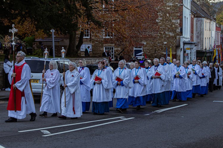 Group Of People In Religious Uniforms Having A Parade