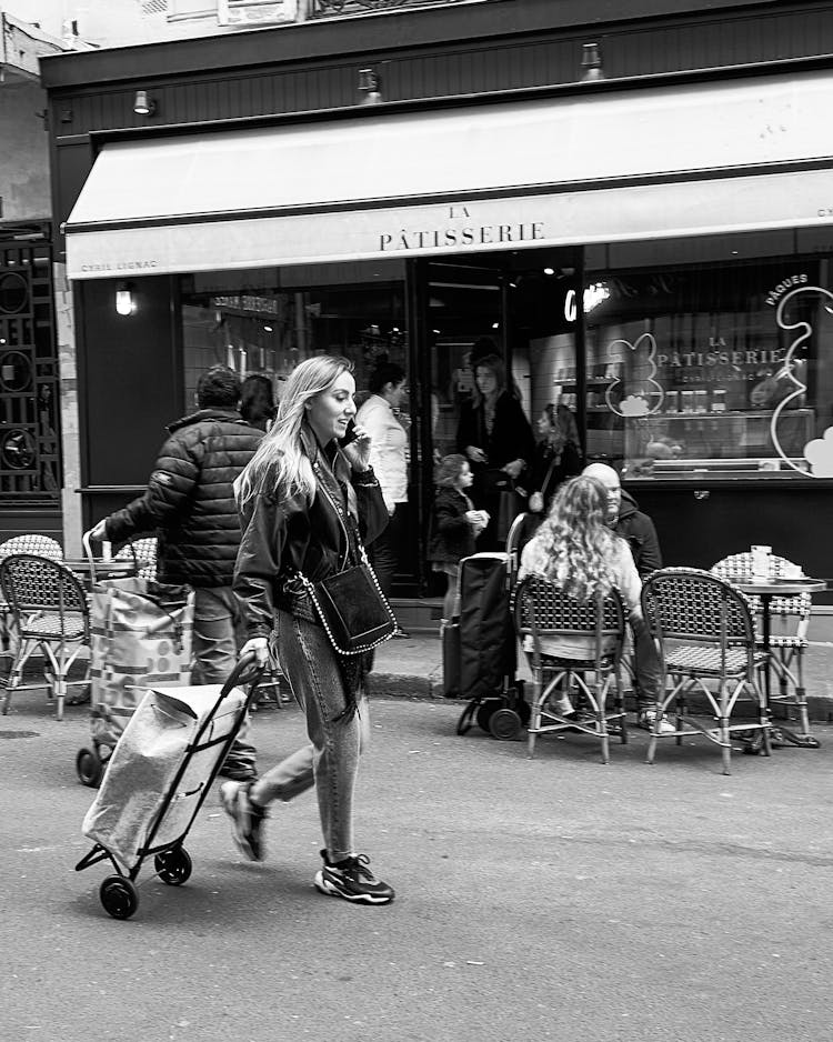 Woman Pulling A Shopping Bag Trolley Walking