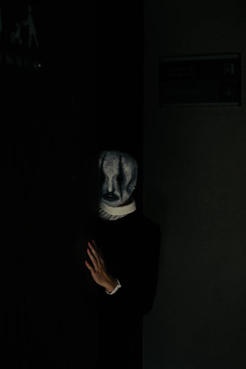 Person Wearing a Creepy Mask