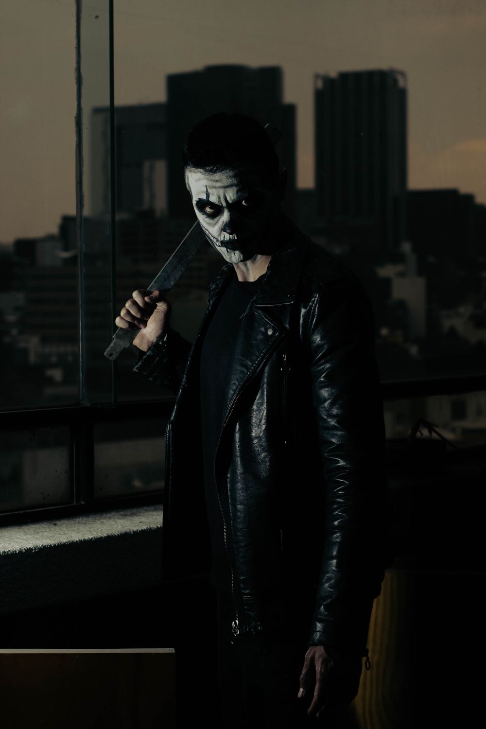 Intimidating Jacket Portrait of Man Wearing Halloween Costume on a Roof · Free Stock Photo