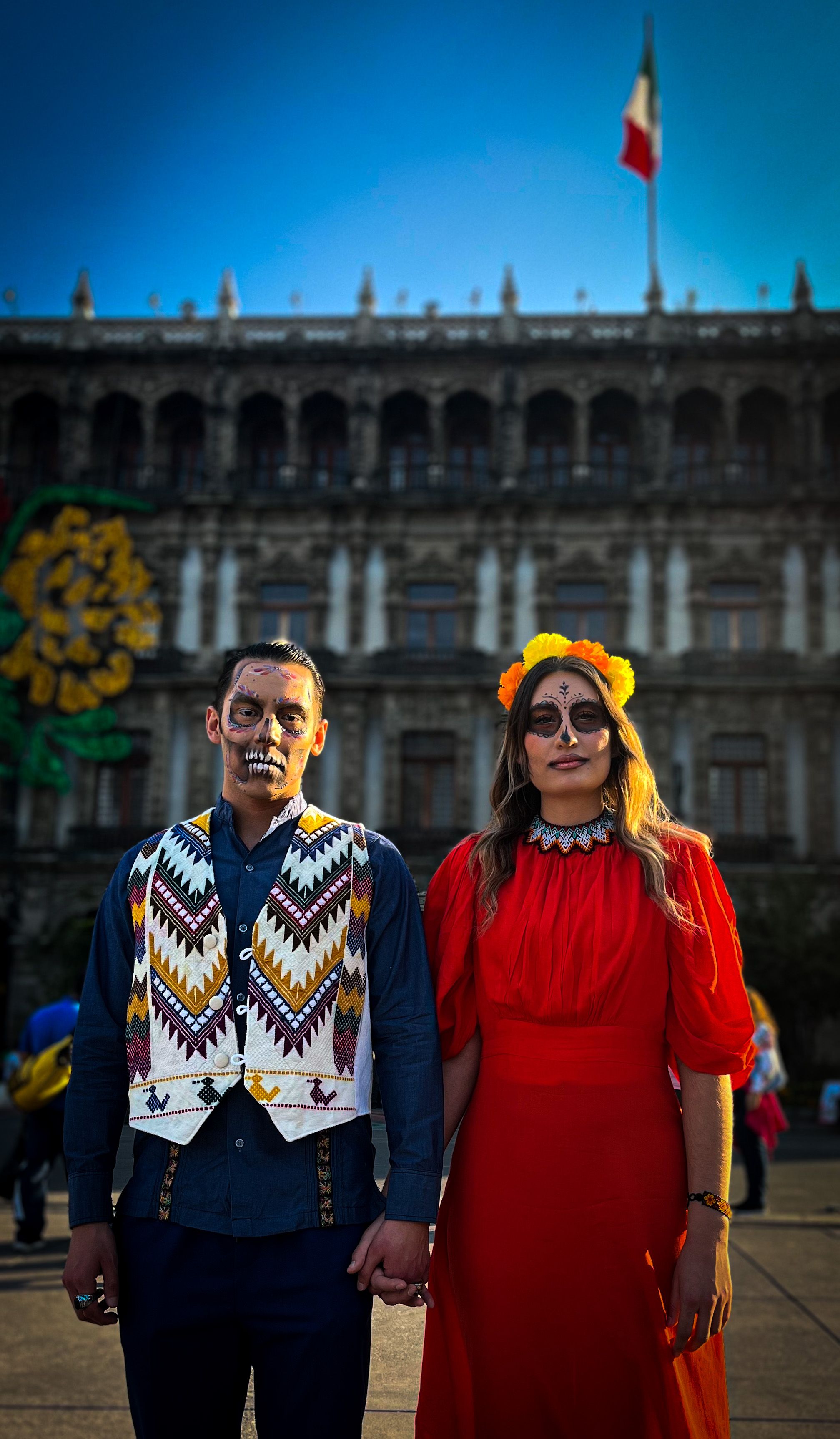 Standing Couple Wearing a Santa Murte Costume · Free Stock Photo